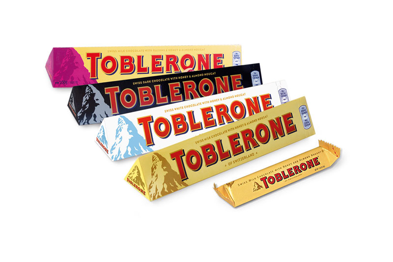 Шоколад toblerone купить. Швейцарский шоколад Тоблерон. Toblerone 35g. Конфеты Toblerone. Toblerone упаковка.